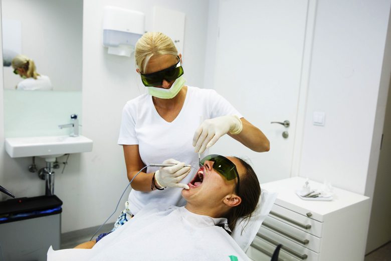 A Patient Getting a Comprehensive Dental Examination.