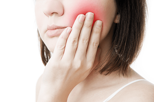 Dealing with dental pain - it's time to see a dentist for relief.