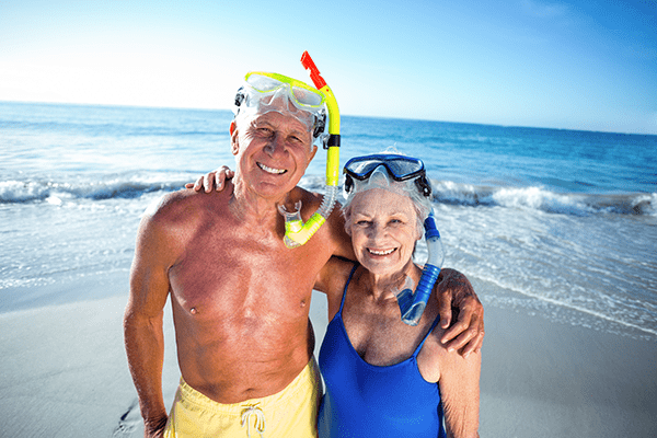 Elderly Couple Snorkeling in Playa del Carmen, Mexico